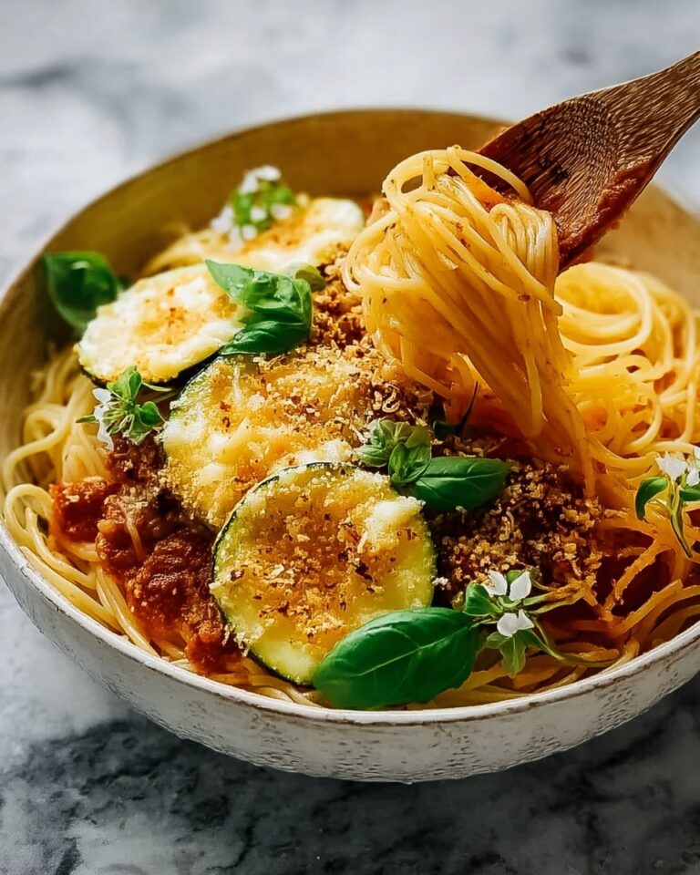 Crispy Zucchini Spaghetti with Cherry Tomatoes, Garlic, and Basil Recipe