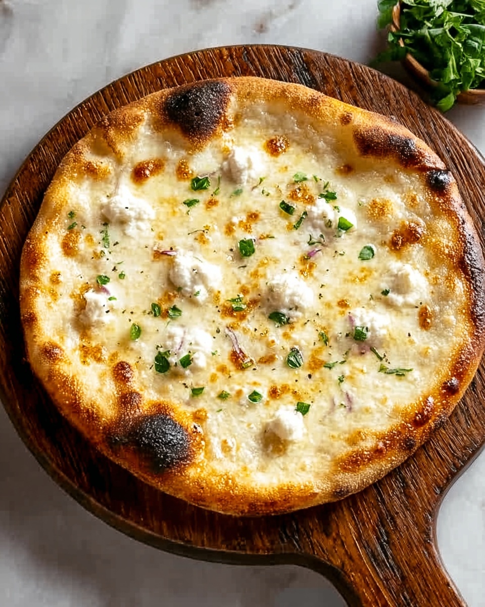 Creamy White Pizza with Garlic and Cheese Recipe - Recipe Image