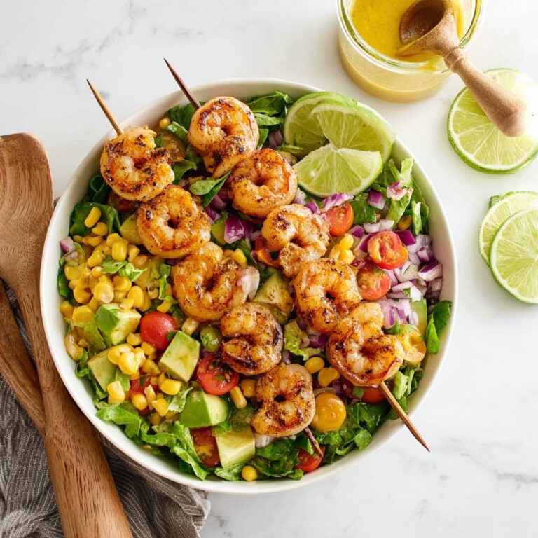 Grilled Shrimp Salad with Avocado, Cherry Tomatoes, and Arugula Recipe