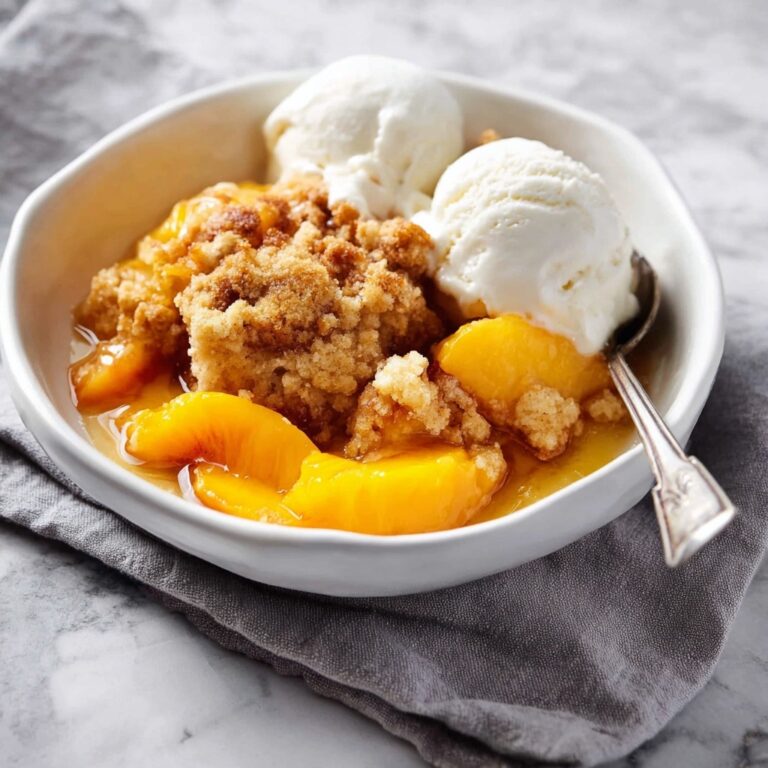 Delicious Peach Cobbler with Juicy Ripe Peaches and Tender Biscuit Topping Recipe